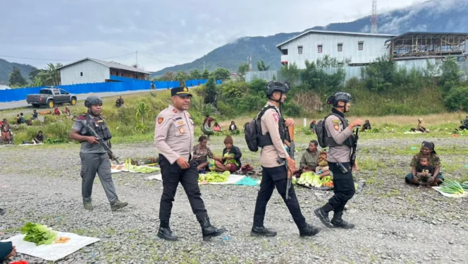 
					Menjaga Papua Tetap Aman, Melindungi Rakyat, Mengawal Masa Depan
